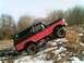 Here is my Bronco posing on a dirt pile I found.  It went right over after I was done.